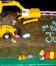 Construction 3rd Birthday Cake,  Chocolate buttercream iced,  sheet cake decorated with everything your 3 year old needs to run his own construction site. Bulldozer, backhoe, cones, jelly bean rocks, and workers.  Everything on this cake is EDIBLE.  (Plastic character figurine was provided by client). (Serves 24-98 party slices)
