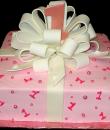 Baby's 1st Present Birthday cake,  Pink buttercream iced,  square decorated with pink pearls, wrapped up with a white ribbon and bow.  Everything on this cake is EDIBLE.   (Serves 12-90 party slices)