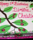 Ladybugs on Leaves 1st Birthday Cake. White buttercream iced, sheet decorated with ladybugs resting on the leaves. Everything on this cake is edible. )Serves 24-98 party slices.) 