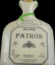 Patron Pearl Bottle Birthday Cake. White buttercream iced, shaped cake decorated with the patron label. Everything on this cake is edible. 