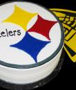 Pittsburgh Steelers Birthday Cake. White butercream iced, round decorated with the Steelers logo. Everything on this cake is edible. (Serves 8-80 party slices.)