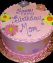 Daisies Birthday Cake. Pink buttercream iced, round decorated with daisies and circles. Everything on this cake is edible. (Serves 8-80 party slices.) 
