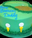 Golf Birthday Cake. Green buttercream iced, round, decorated with golf balls, grass and golf tees. Everything on this cake is edible. (Serves 8-80 party slices) 